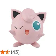 Różowy Jigglypuff z wielkim, niebieskim okiem i uśmiechem, mrugający do Ciebie.