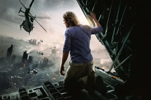 Mężczyzna na pokładzie samolotu obserwuje zniszczone miasto, nad którym latają helikoptery. To scena z filmu World War Z 2.